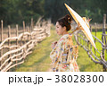 Japanese women wear kimono holding umbrellas  38028300
