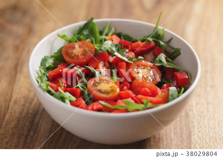 fresh salad with cherry tomatoes and arugula fresh salad with cherry tomatoes and arugula 38029804