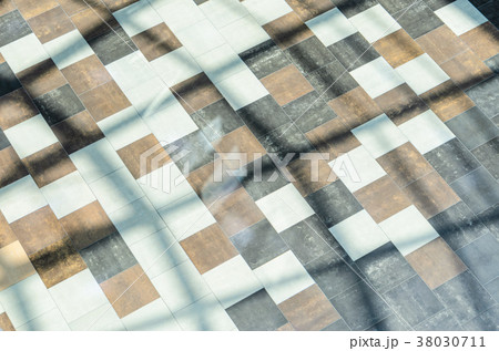 Bright colored tile floor In the sun. Bright colored tile floor In the sun. 38030711