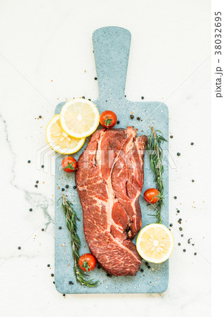 Raw beef meat on cutting board 38032695