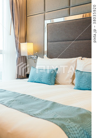 White pillow on the bed 38035920