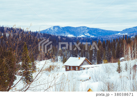 house in winter in the village 38038671