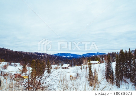 house in winter in the village 38038672