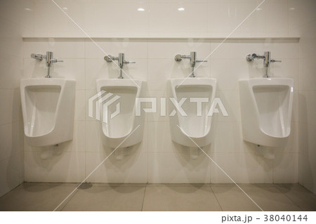 Row of outdoor urinals men public toilet room Row of outdoor urinals men public toilet room 38040144
