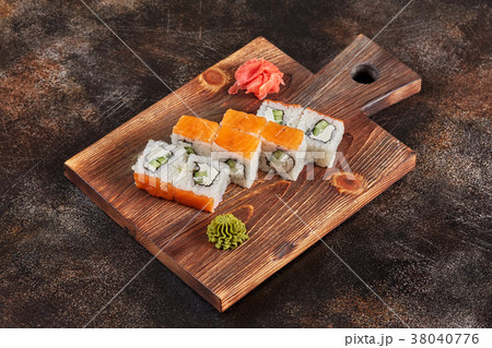 Japanese food sushi maki rolls on wooden board 38040776