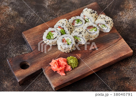 Japanese food sushi maki rolls on wooden board 38040791