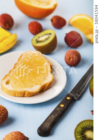 Jam of tropical fruits on bread Jam of tropical fruits on bread 38041594