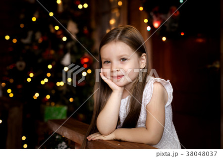 little girl waiting for Santa Claus. little girl waiting for Santa Claus. 38048037