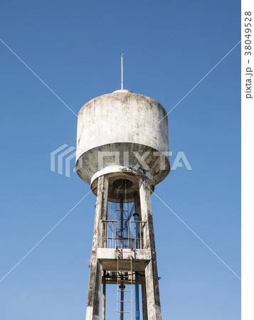 Concrete water tower with the metal ladder. Concrete water tower with the metal ladder. 38049528