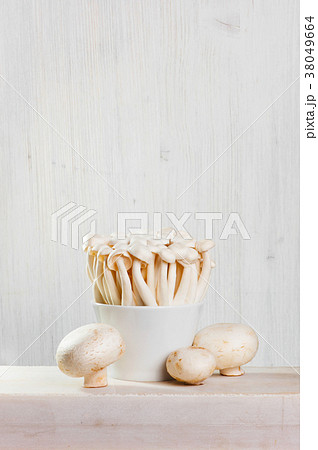 Fresh raw champignons and honey agarics Fresh raw champignons and honey agarics 38049664