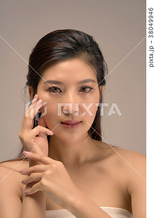 Happy beautiful asian girl with the fresh skin. Happy beautiful asian girl with the fresh skin. 38049946