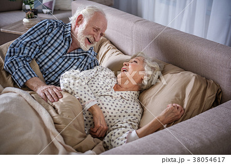 Happy elderly man and woman waking up 38054617