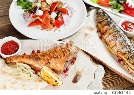 grilled mackerel and sea bass. Salad of fresh 38063449
