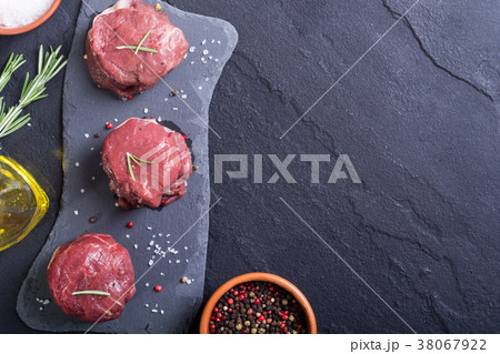 Raw fillet mignon Raw fillet mignon 38067922