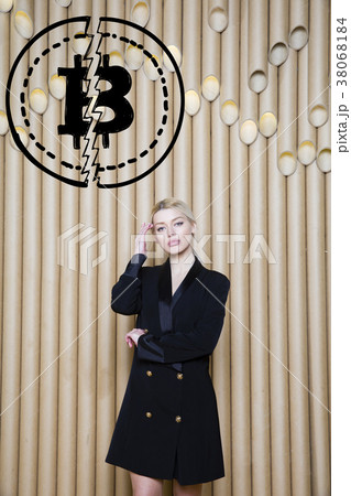 Beautiful blond woman showing standing near Beautiful blond woman showing standing near 38068184