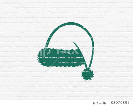 Holiday concept: Christmas Hat on wall background 38070395
