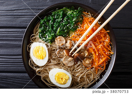 Buckwheat soup noodles with vegetables, shiitake Buckwheat soup noodles with vegetables, shiitake 38070753