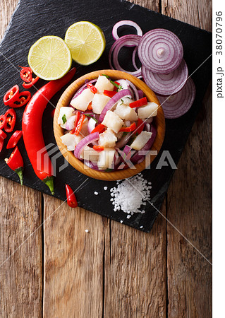 Healthy fish ceviche of cod with onion and pepper 38070796