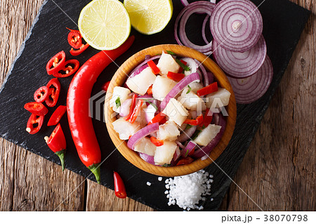 Healthy fish ceviche of cod with onion and pepper 38070798