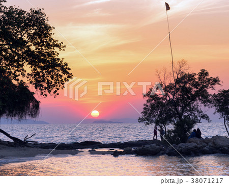 Sunset at the beach 38071217