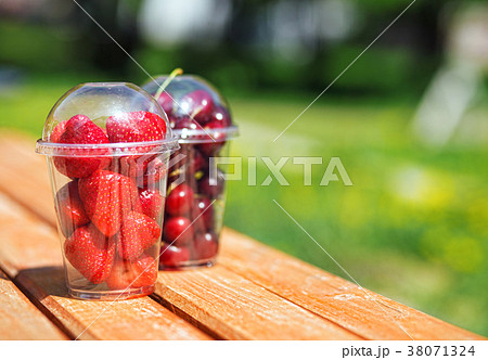 Berries in plastic cup 38071324