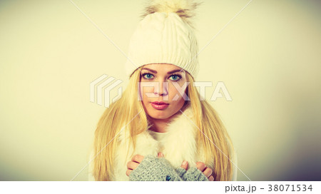 Woman wearing warm winter clothing Woman wearing warm winter clothing 38071534