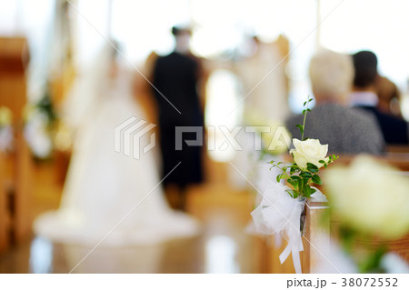 Beautiful flower wedding decoration in a church during wedding ceremony 38072552
