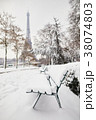 Eiffel tower on a day with heavy snow 38074803