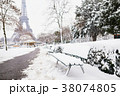 Eiffel tower on a day with heavy snow 38074805