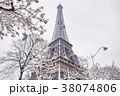Eiffel tower on a day with heavy snow 38074806