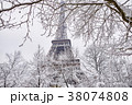 Eiffel tower on a day with heavy snow 38074808