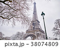 Eiffel tower on a day with heavy snow 38074809