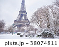 Eiffel tower on a day with heavy snow 38074811