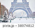 Eiffel tower on a day with heavy snow 38074812