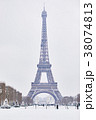 Eiffel tower on a day with heavy snow 38074813