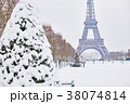 Eiffel tower on a day with heavy snow 38074814