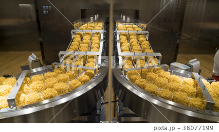 Instant noodles in production process 38077199
