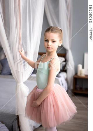 Cute little ballerina in pink ballet costume Cute little ballerina in pink ballet costume 38080591