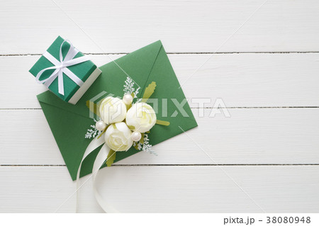 Wedding invitation card, letter in green envelope. 38080948