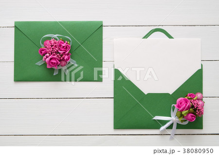 Wedding invitation cards, envelopes with flowers. 38080950