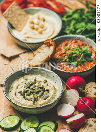 Vegetarian dips hummus, babaganush, muhammara over Vegetarian dips hummus, babaganush, muhammara over 38085577