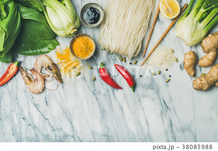 Flat-lay of Asian cuisine ingredients over marble Flat-lay of Asian cuisine ingredients over marble 38085988