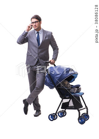 Young businessman nursing child in pram isolated Young businessman nursing child in pram isolated 38086128