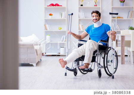 Injured young man recovering at home Injured young man recovering at home 38086338
