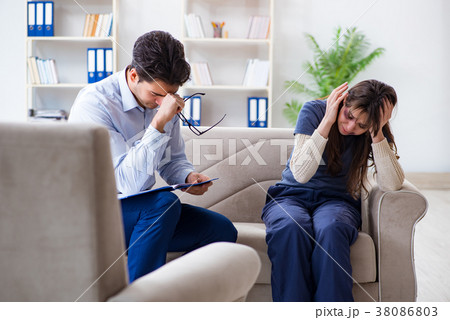 Psychologist counselling woman beaten by husband 38086803