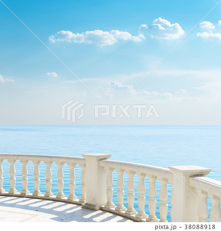 view to the sea from a balcony under cloudy sky view to the sea from a balcony under cloudy sky 38088918