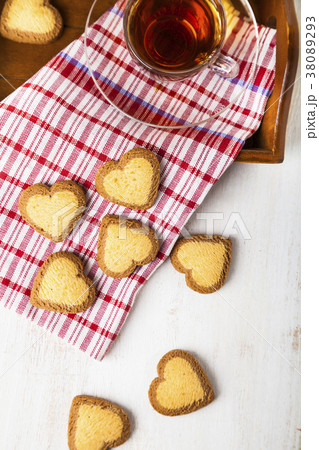 Heart-shaped cookies and tea 38089293