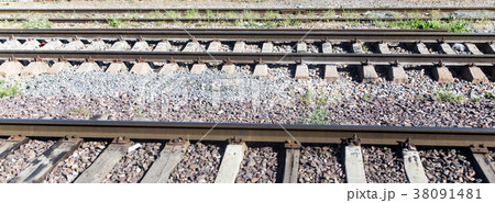 Rails from the train window as a background Rails from the train window as a background 38091481