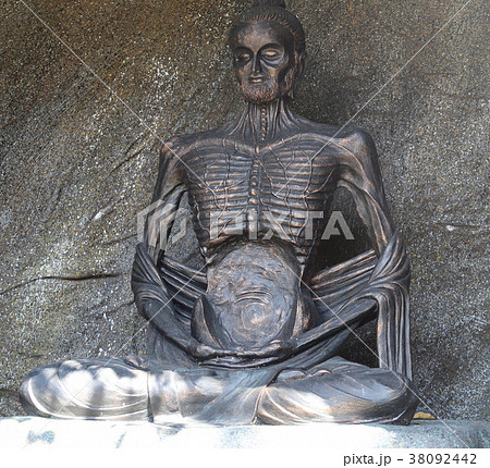 Statue of Buddha in a sitting position Statue of Buddha in a sitting position 38092442