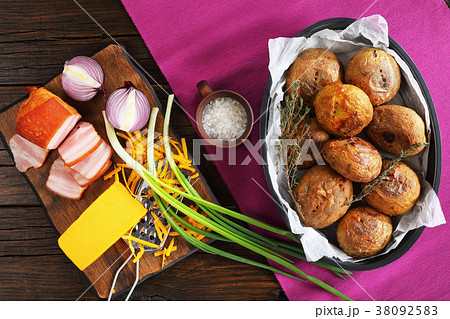 tasty baked whole potatoes, top view tasty baked whole potatoes, top view 38092583